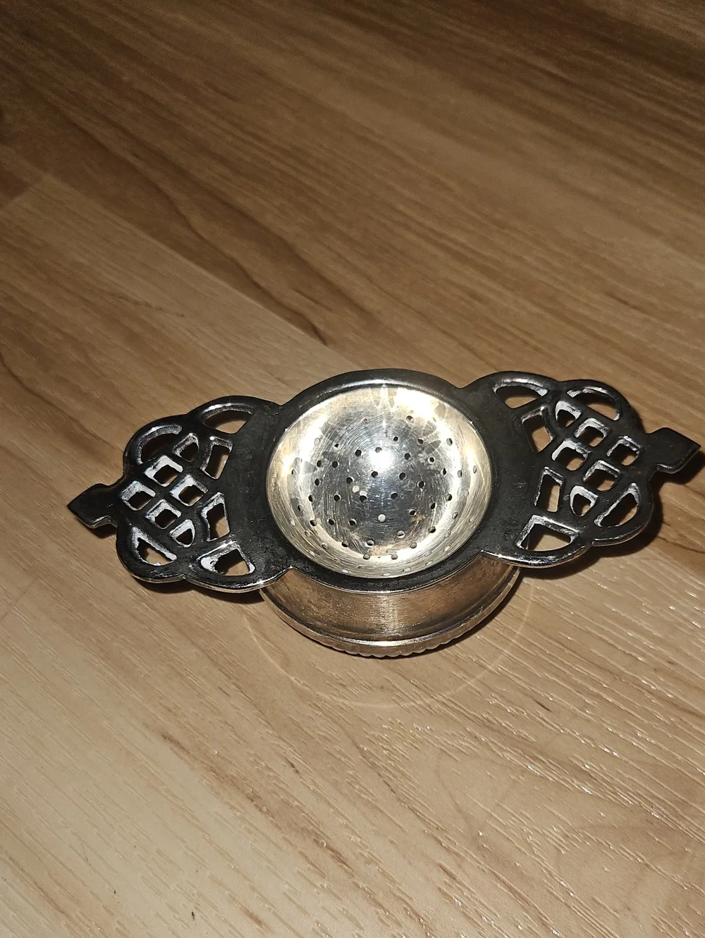 Silver Plated Tea Strainer with Ornate Handles